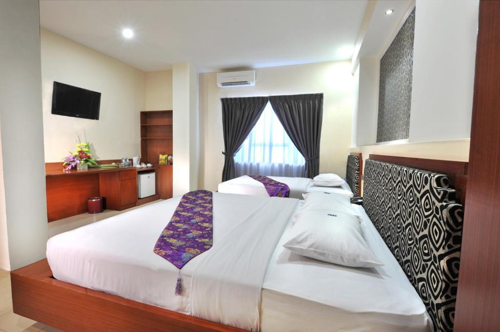 Gaja Hotel Pekanbaru Pokoj fotografie